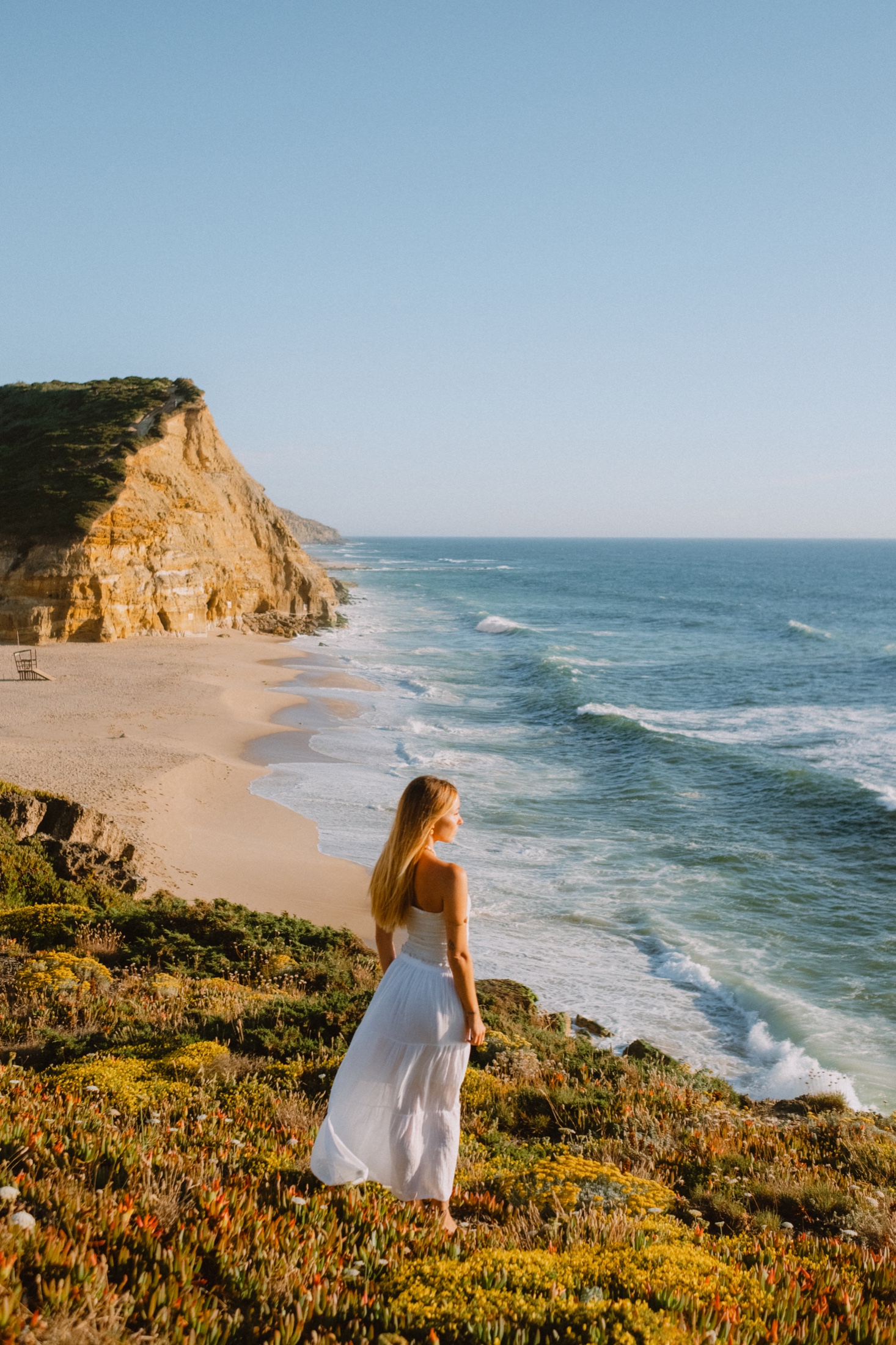 Amelia overlooking São Julião beach