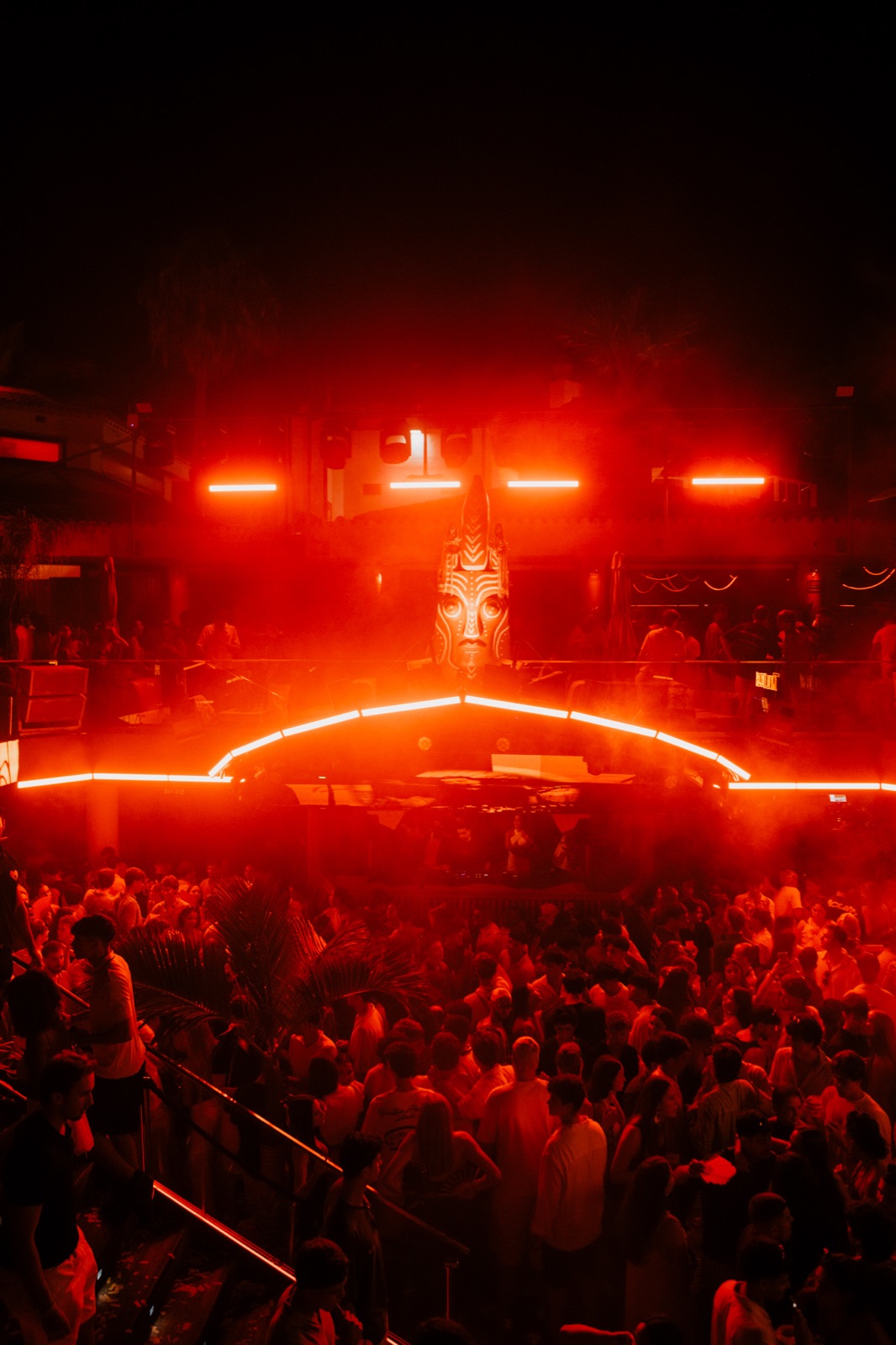Red beams crossing the venue