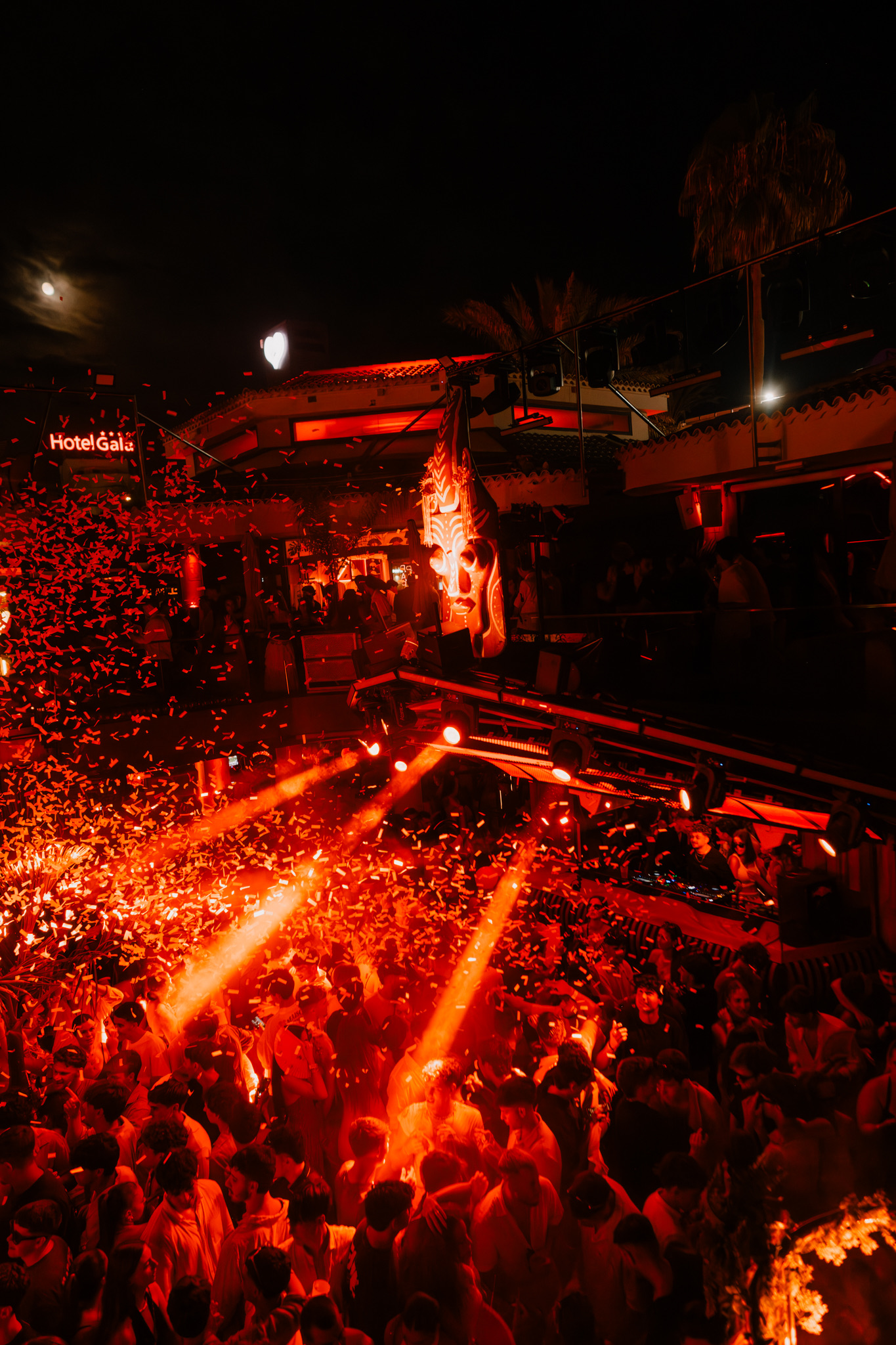 Confetti and red lights over the Papagayo dance floor