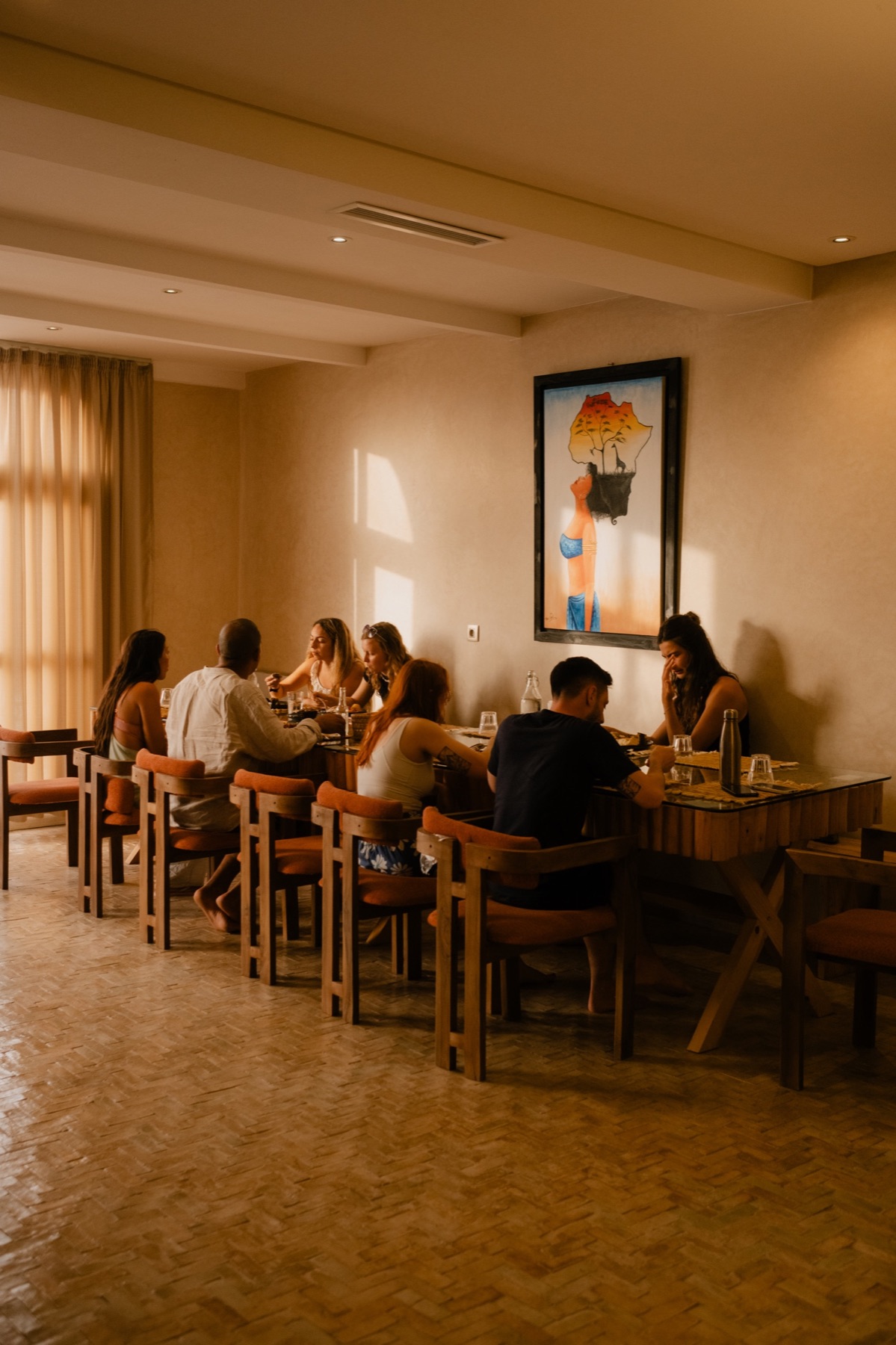 Guests eating together at Surf Villa Morocco